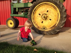 Ella-playing-with-tractor