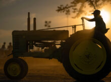 John Deere in sunset