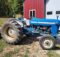 Ford 3000 tractor pulling mower deck